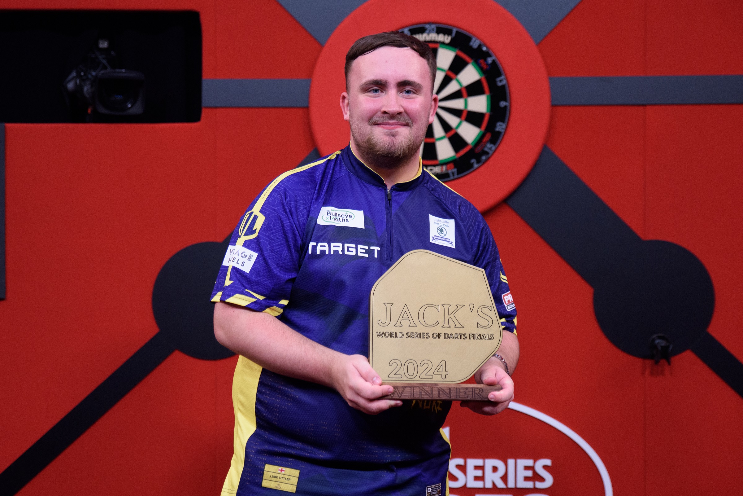 Sensational Littler storms to World Series of Darts Finals title on