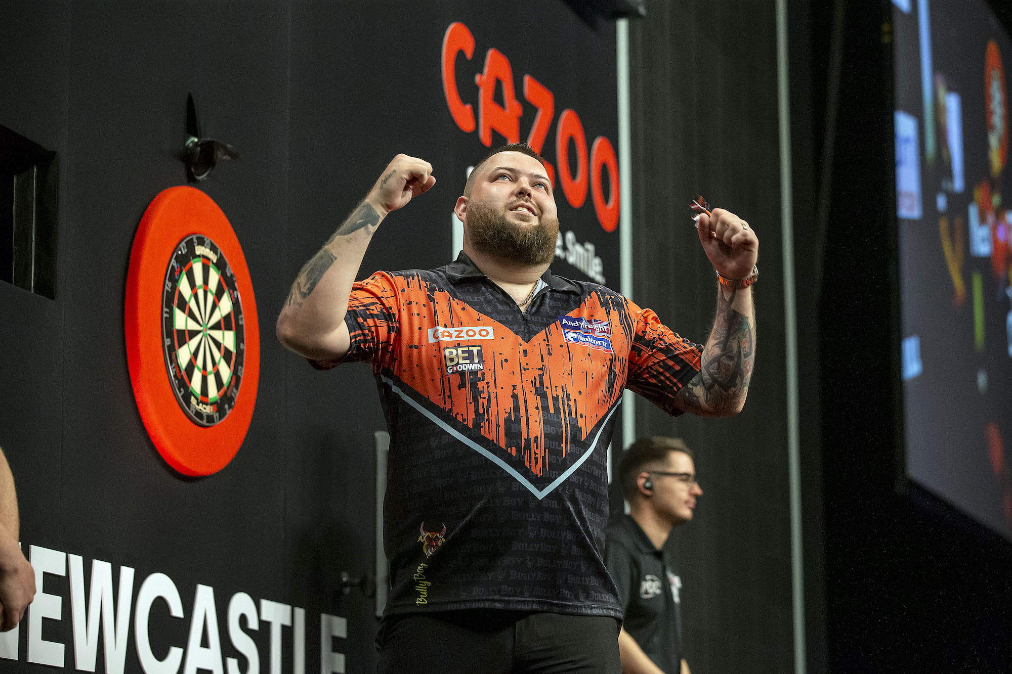 Michael Smith celebrates victory in Newcastle