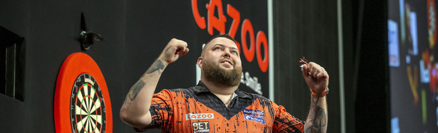 Michael Smith celebrates after winning Night 16 in Newcastle