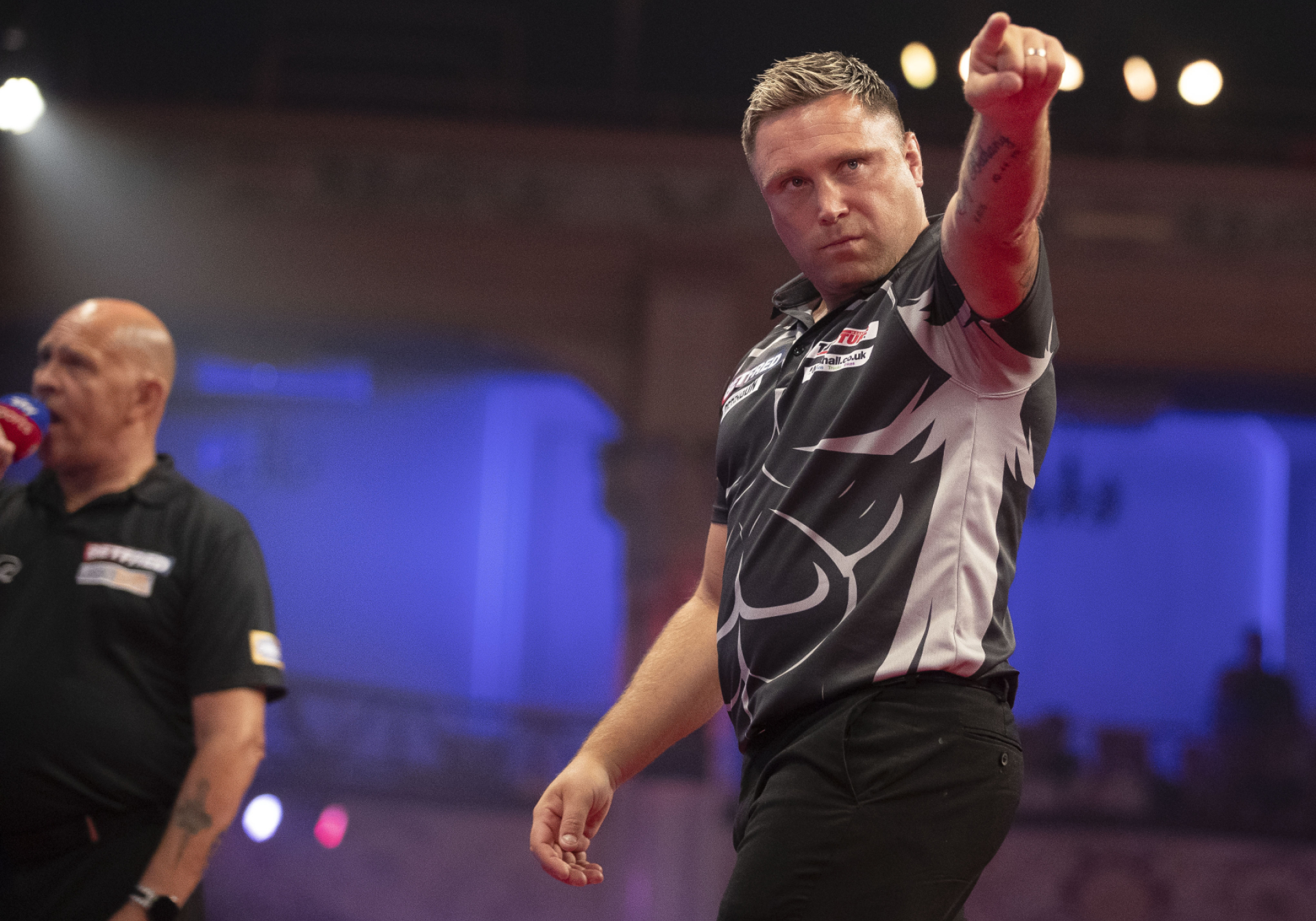 Gerwyn Price points to his supporters