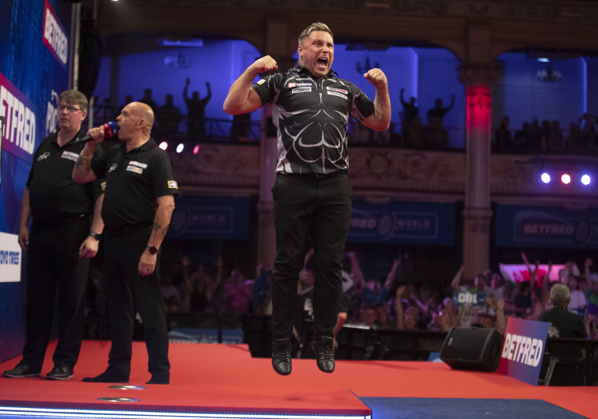 Gerwyn Price celebrates victory on the Winter Gardens stage