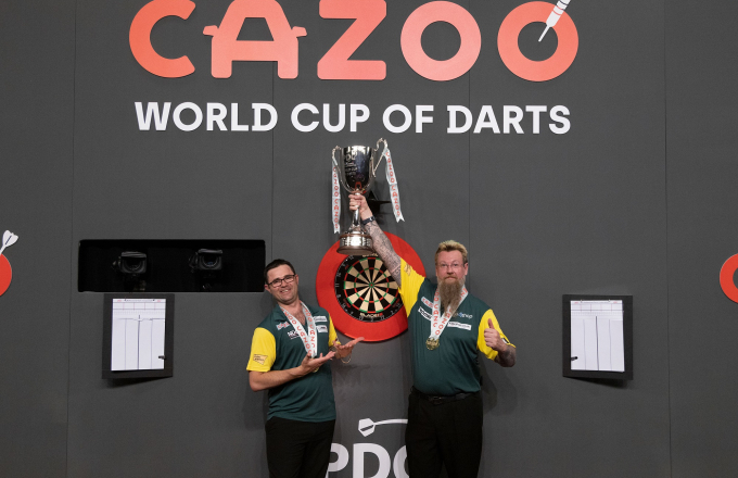 Damon Heta and Simon Whitlock celebrate their Cazoo World Cup success