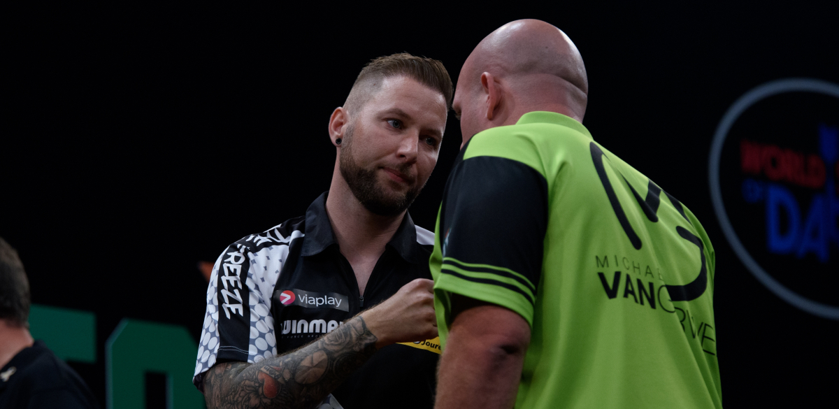 Danny Noppert shakes hands with Michael van Gerwen in Amsterdam