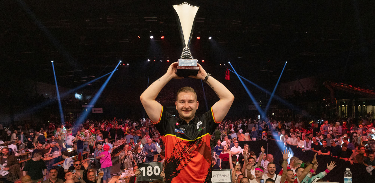 Dimitri Van den Bergh lifts the Nordic Darts Masters trophy