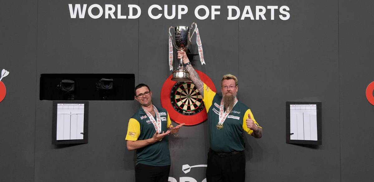 Damon Heta and Simon Whitlock celebrate their Cazoo World Cup success