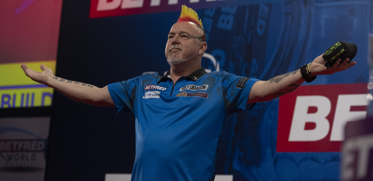 Peter Wright dances across stage at the 2021 World Matchplay