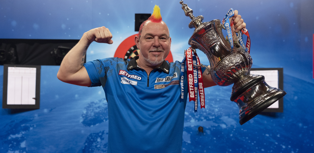 Peter Wright holding the Phil Taylor Trophy at the 2021 World Matchplay