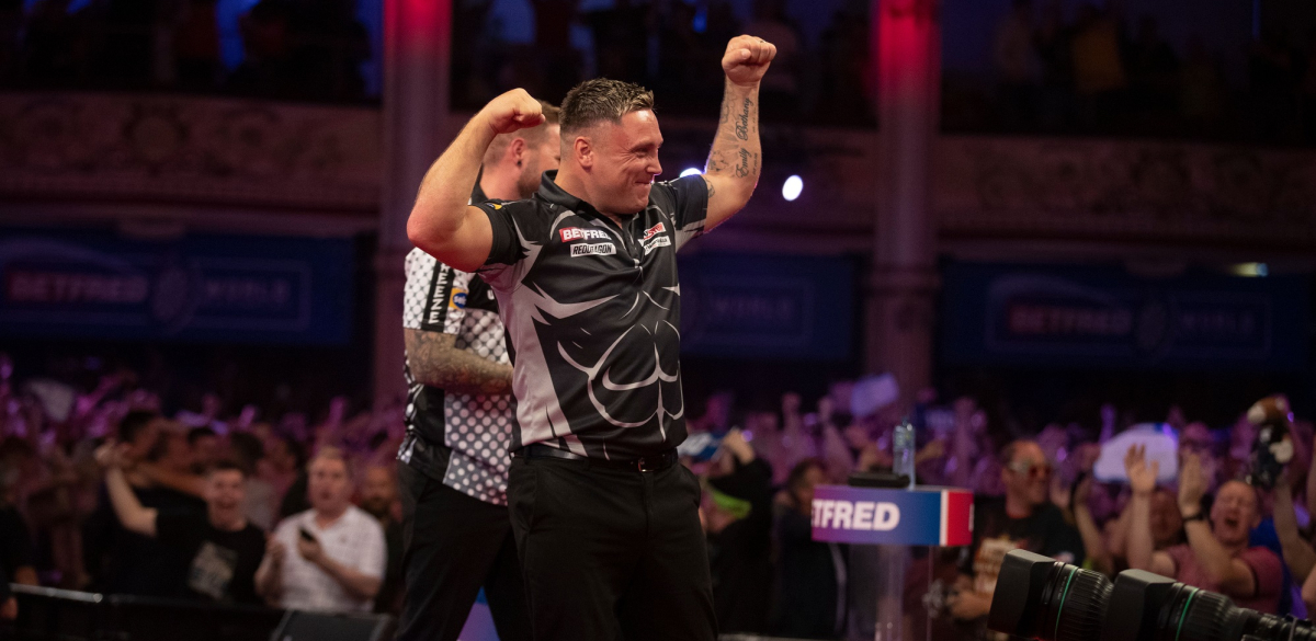 Price celebrates his nine-darter against Danny Noppert