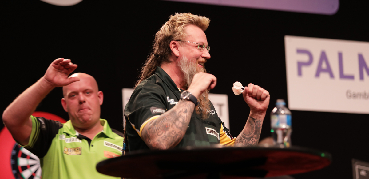 Simon Whitlock celebrates his win over Michael van Gerwen (PDC)