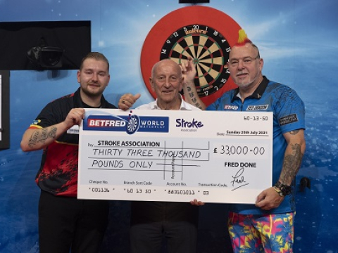 Betfred's Fred Done with Dimitri Van den Bergh & Peter Wright (Lawrence Lustig, PDC)