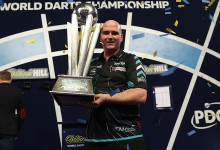 Rob Cross holding World Championship trophy (Lawrence Lustig, PDC)