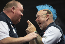 Peter Wright and John Henderson celebrate at the Cazoo World Cup