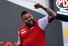 Michael Smith celebrates at the 2022 World Cup of Darts