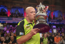 Michael van Gerwen celebrates his third Betfred World Matchplay triumph