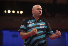 Rob Cross celebrates his win over Chris Dobey