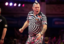 Peter Wright celebrates his tie-break win over Krzysztof Ratajski