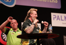 Simon Whitlock celebrates his win over Michael van Gerwen (PDC)