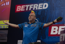 Peter Wright dances across stage at the 2021 World Matchplay