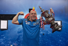 Peter Wright holding the Phil Taylor Trophy at the 2021 World Matchplay